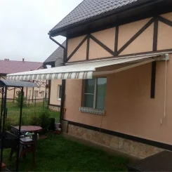 Выдвижная маркиза для загородного дома